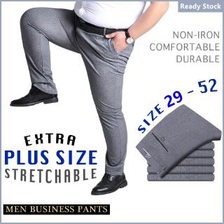 Grande más el tamaño de los hombres elásticos pantalones de negocios no hierro Formal de