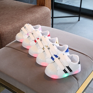 Zapatos de los niños 2020 nuevos zapatos luminosos blanco zapatos shell zapatos LED versión flash