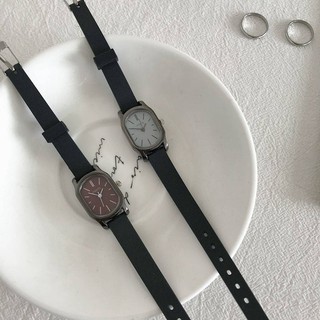 Reloj de pulsera de mujer estilo ins estilo blanco simple correa delgada compacta temperamento estilo artístico impermeable estilo versátil para estudiantes