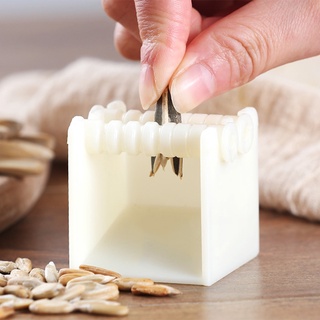 confiable semillas de melón peeling herramienta hogar automática de plástico de semillas de shell (7)