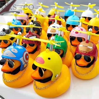 Pequeños patos amarillos con cascos pequeños con luz de noche para motos y coches