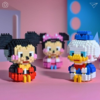Disney Mini bloques de construcción de dibujos animados personaje muñeca juguete Mini muñeca modelo rompecabezas montaje agarre juguete