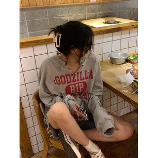 Perforado carta suelta impreso manga larga suéter de moda