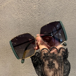 las nuevas gafas de sol de sentido femenino gran marco era delgada personalidad metal medio marco anti-ultravioleta gafas de sol tendencia tiro calle (1)