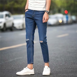 Verano de la marca de moda de los hombres nuevo estilo agujero Jeans suelto pies de moda juventud Casual pantalones