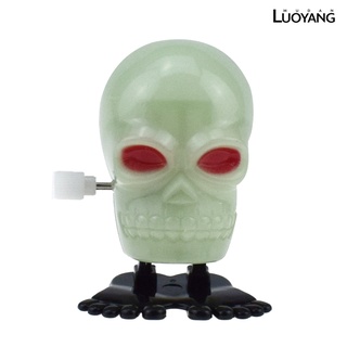 Halloween luminoso espantoso cráneo globo ocular forma rebotando viento reloj juguete