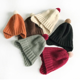 Otoño e invierno Bebé gorro de lana lindo de Color sólido Bola de piel tejida sombrero de bebé orejeras sombrero de los niños moda todo-fósforo moda
