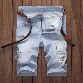 Verano agujero bordado agujero cinco fuera Jeans masculino suelto tendencia personalizada recta gato impresión Retro corto exterior