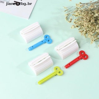 Jia 1 pza exprimidor de pasta de dientes fácil dispensador tubo sostenedor de ventosa soporte para enrollar.
