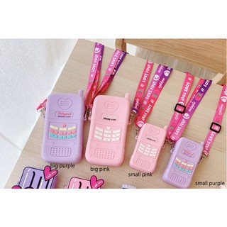 Nueva bolsa de silicona suave con forma de teléfono para bebé, color rosa