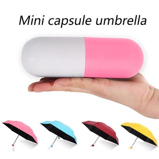 Paraguas cápsula plegable paraguas Anti lluvia forma UV cápsula minimalista Mini paraguas