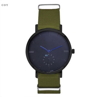 reloj de pulsera simple redondo con correa ajustable de nylon para hombres y mujeres