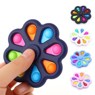 Pop it Juguete de descompresión giratorio con punta de dedo de pétalos de siete colores / Fidget Spinner