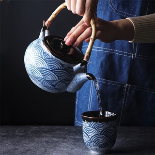 Hogar mar ondulación tetera cerámica taza de té Kung Fu taza de agua filtro de tetera olla Dinkware