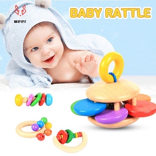 Bebé mano sosteniendo la campana de madera Orff instrumento musical bebé educación temprana juguete de los niños juguete