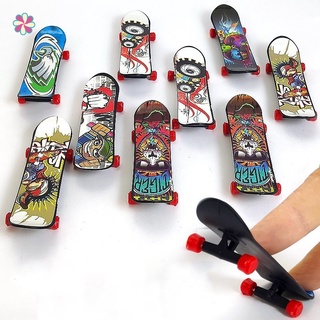 1 pza creativa Mini Dedo patineta Para niños Fingertip De Plástico deportivo Para regalo color Entrega aleatoria YKD (1)