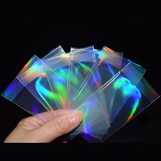 50 Unids/set Transparente Sello De La Tarjeta Mangas Láser Intermitente Película Protector Holográfico Para Kpop De Fotos YGO MTG (5)