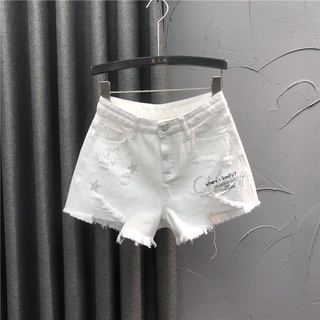 Productos europeos blanco de cinco puntas estrella caliente rhinestone pantalones cortos de mezclilla mujer rasgado cintura alta delgada un caliente pantalones