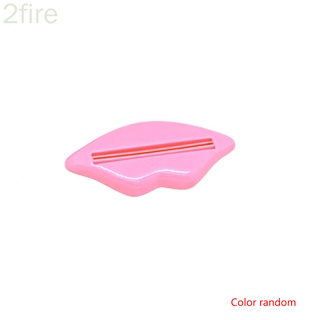 color aleatorio en forma de labios tubo de pasta de dientes lavado facial espuma limpiador rodillo exprimidor dispensador abs clip
