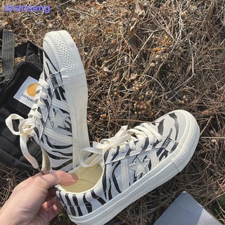 Zebra patrón zapatos de lona mujer 2021 primavera nueva versión de ulzzang estudiante casual salvaje super fuego ins tablero zapatos marea