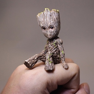 ALLGOODS figura juguetes Groot figura para niños Mini Groot árbol hombre Groot 6CM sentado para regalos modelo muñeca vengadores figura de juguete de acción (6)