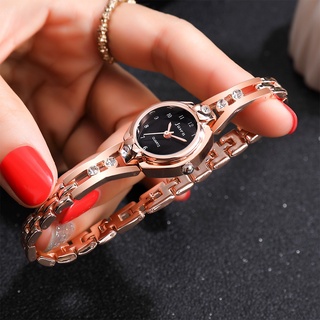 reloj de cuarzo de acero inoxidable con incrustaciones de diamantes de estrella simple a la moda
