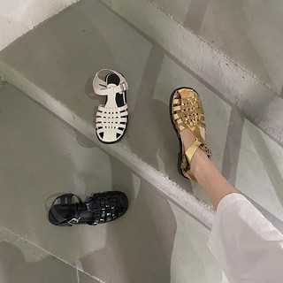 Tejido simple 2021 verano nuevos zapatos planos retro romanos Baotou sandalias mujer palabra salvaje hebilla solo zapato marea