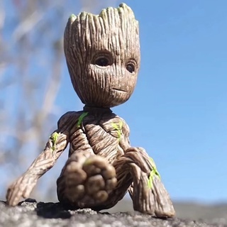 ALLGOODS figura juguetes Groot figura para niños Mini Groot árbol hombre Groot 6CM sentado para regalos modelo muñeca vengadores figura de juguete de acción (7)