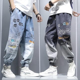 harlan marea marca de dibujos animados graffiti impresión gradiente jeans masculino versión coreana de suelto casual pantalones hip-hop pantalones masculinos