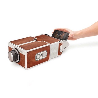 Mini proyector de teléfono inteligente de cartón portátil para proyector de cine en casa