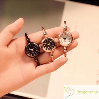 1 reloj de cuarzo de pulsera para mujer y niña/estudiante/Mini reloj redondo de aleación Vintage