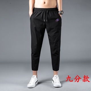gancho púrpura logotipo de verano personalidad todo-partido pantalones transpirable delgado de nueve puntos pantalones coreanos clásicos casual pantalones deportivos